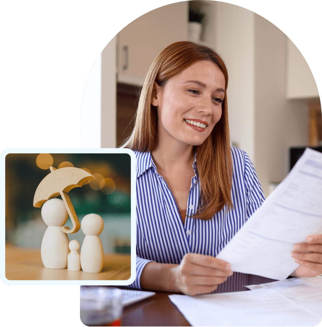 A woman happily reviewing documents while a creative mushroom sculpture decorates the table.