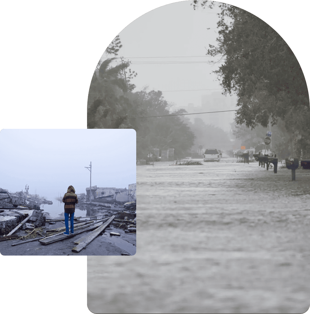 Flooded street with cars and pedestrians during heavy rain.